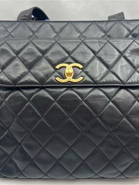 CHANEL Black Quilted Shoulder Bag with Gold CC Hardware